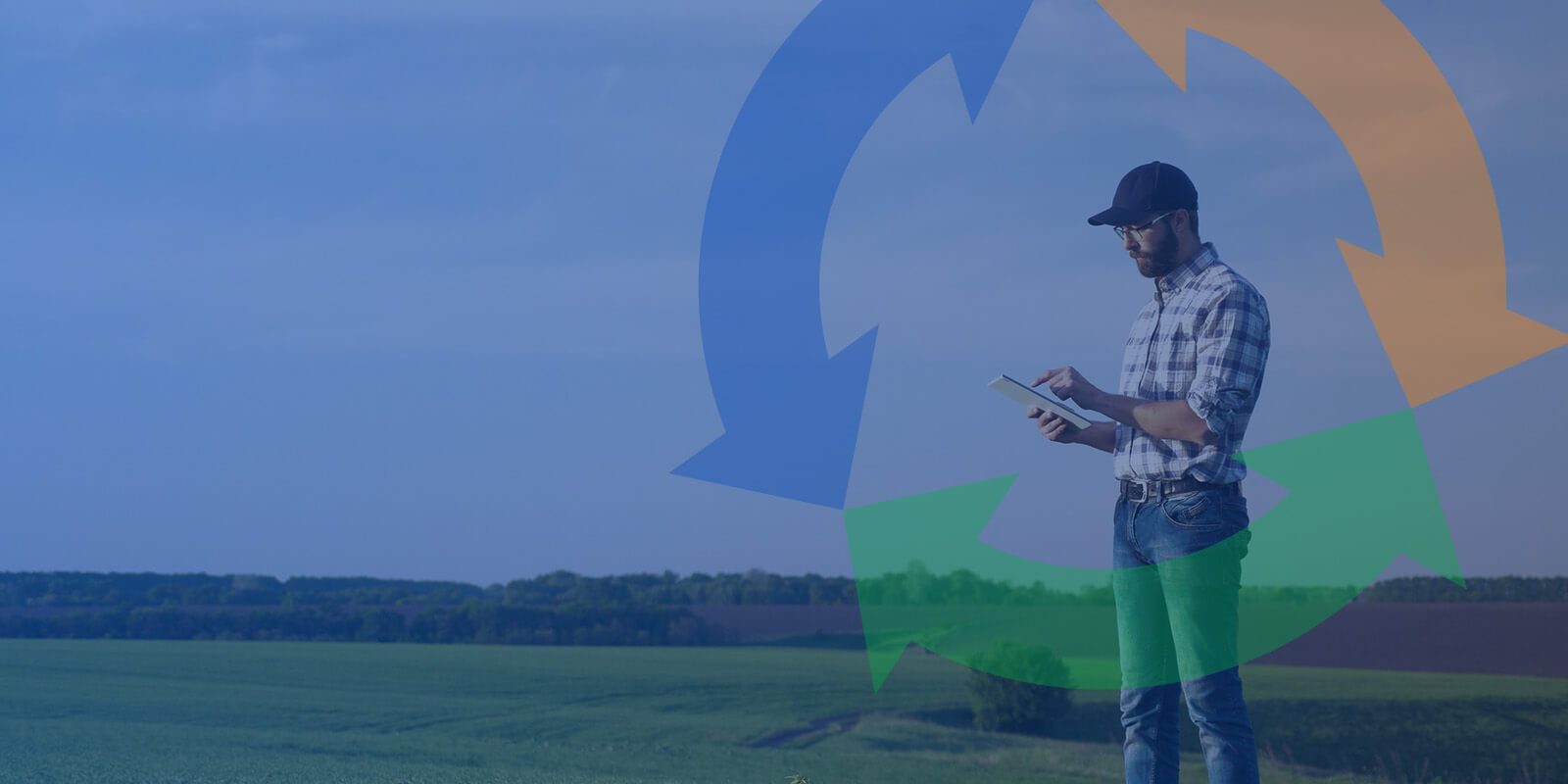 A farmer stands in a field using a tablet to work. Conexon icon overtop.